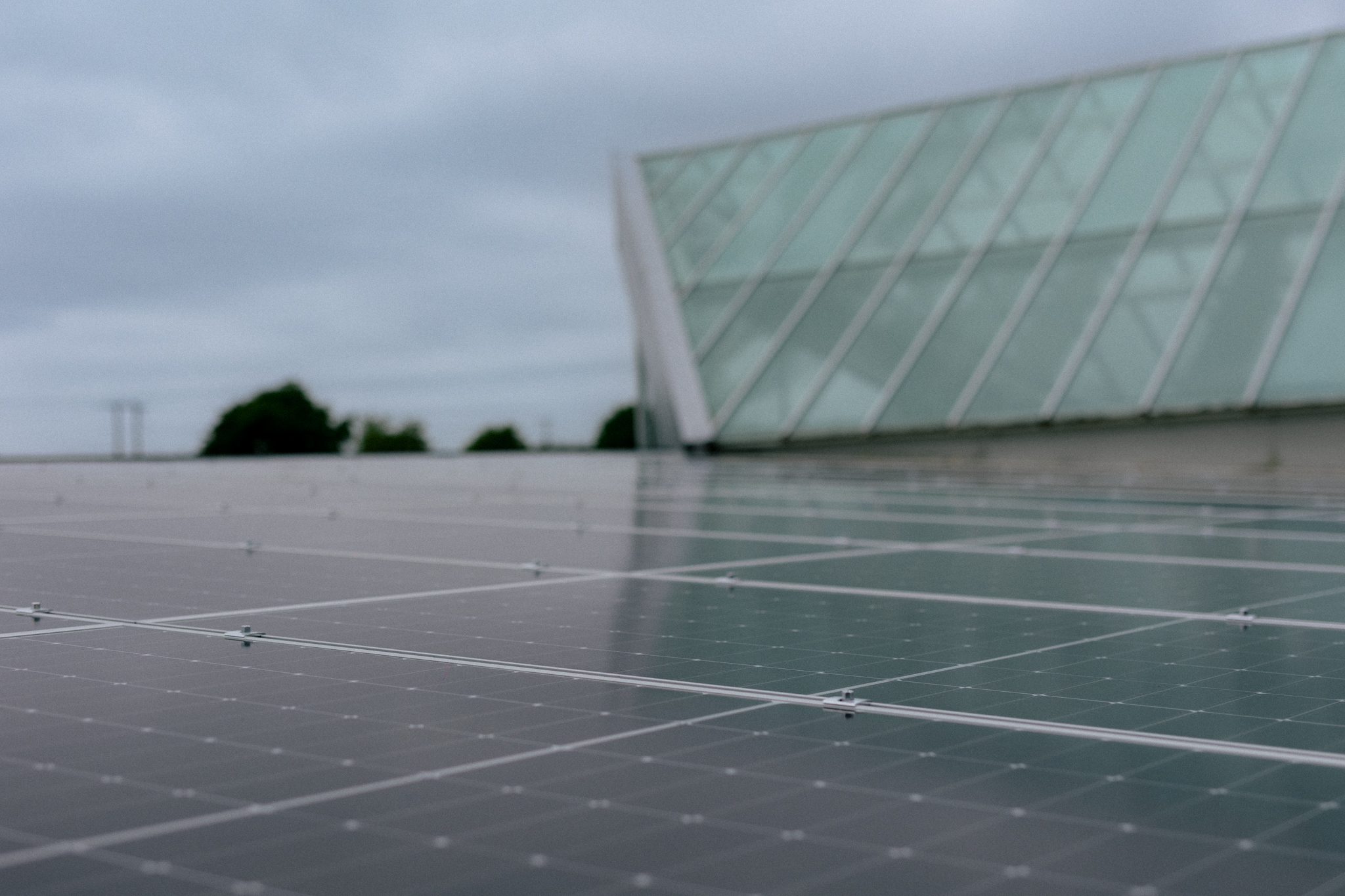 A close up view of solar panels on a flat roof | Solar Generation