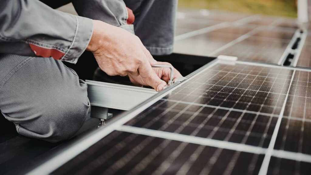 roof inspector checking on a solar panel | SEAI Solar Grant 2026: Your Step-by-Step Claiming Guide
