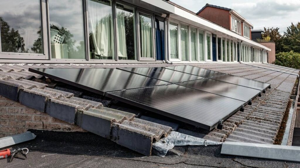 solar panel on a side roof under a cloudy sky | Do Solar Panels Work in the Northwest of Ireland? Yes, Here's the Proof