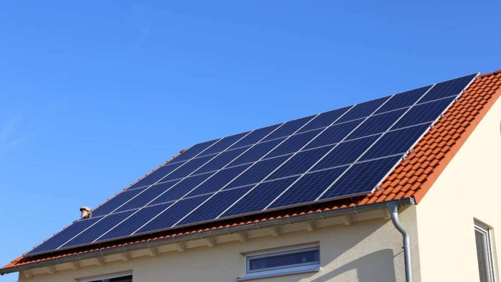 solar panel on an orange roof with a clear blue sky on the background | SEAI Solar Grant 2026: Your Step-by-Step Claiming Guide